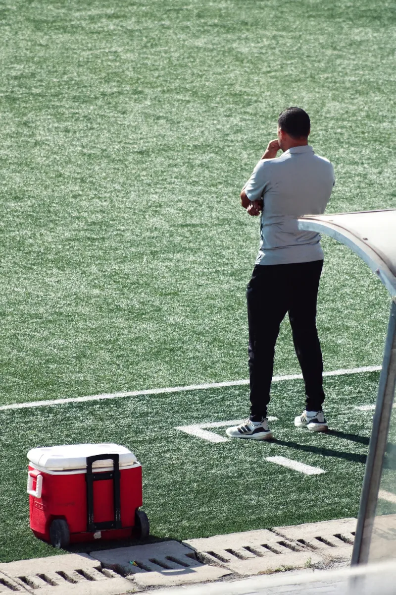 Sideline, at the edge of the pitch